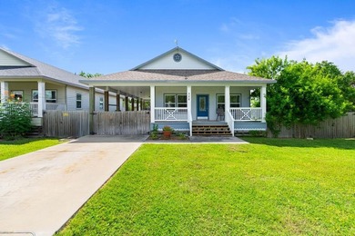 Situated on two spacious lots, this charming 3-bedroom, 2-bath - photo 1
