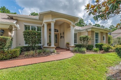 EXQUISTIE FLORIDA LIVING ABOUNDS IN THIS INVITING 3/2/2 WITH DEN - photo 1