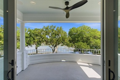 This elevated waterfront home with a private dock has been - photo 33