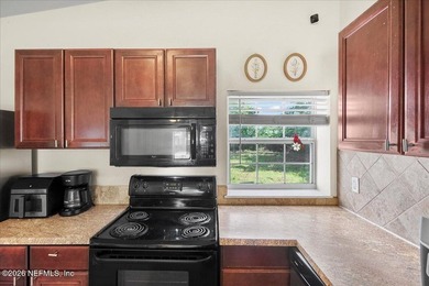 Energy efficient living meets timeless charm! Welcome to 9823 - photo 7