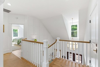 This elevated waterfront home with a private dock has been - photo 51