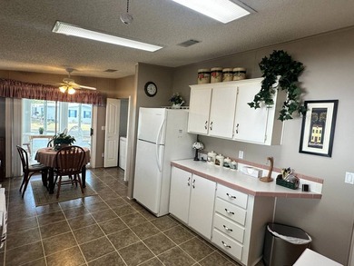 This meticulously maintained, fully furnished 2-bedroom home - photo 8