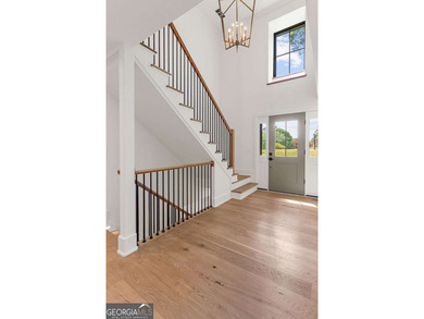 This incredible home is masterfully reimagined with intentional - photo 10
