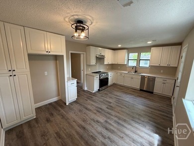 Where else can you find a fully remodeled home in Savannah under - photo 2
