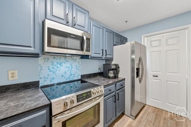 Enjoy maintenance-free, island-style living just minutes from - photo 10