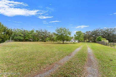 Welcome home to your private oasis with this pristine 4-bedroom - photo 3