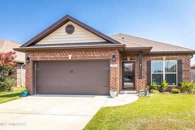Welcome home to this charming 3-bedroom, 2-bath home in one of - photo 1