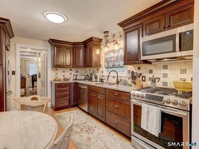 Welcome home to this picturesque brick Colonial, where timeless - photo 11