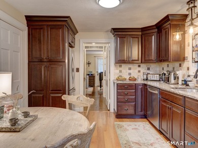 Welcome home to this picturesque brick Colonial, where timeless - photo 12