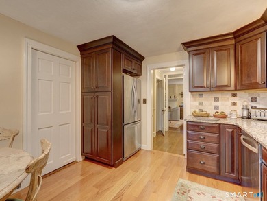 Welcome home to this picturesque brick Colonial, where timeless - photo 14