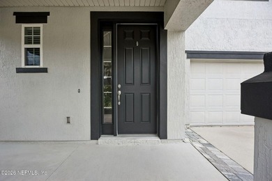 Perfectly positioned on a massive corner lot in the highly - photo 4