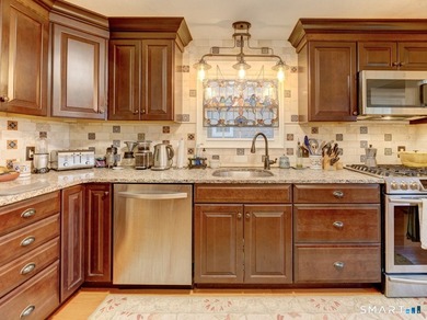 Welcome home to this picturesque brick Colonial, where timeless - photo 16