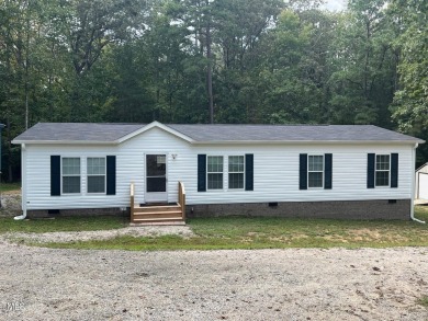 2023 Doublewide mobile home on a .81 acre lot with platted cart - Lake Home For Sale in Henderson, North Carolina