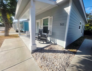 Your coastal escape awaits at 121 Oasis Circle! This charming 1 - photo 4