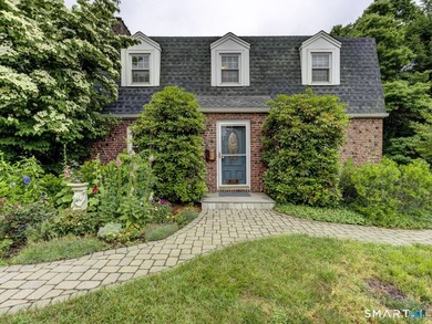 Welcome home to this picturesque brick Colonial, where timeless - photo 36