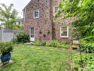Welcome home to this picturesque brick Colonial, where timeless - photo 39