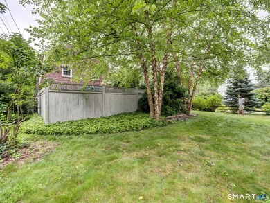Welcome home to this picturesque brick Colonial, where timeless - photo 40