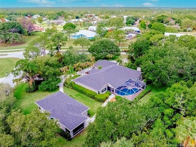 Welcome to Pinecrest Lakes! Situated on 1.1 acres, this unique - photo 1