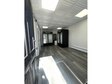 Step into a beautifully renovated 728 sq ft office building that - photo 3