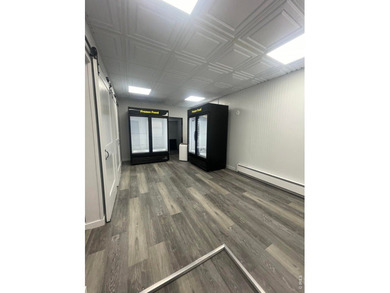 Step into a beautifully renovated 728 sq ft office building that - photo 4