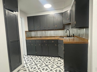 Step into a beautifully renovated 728 sq ft office building that - photo 8