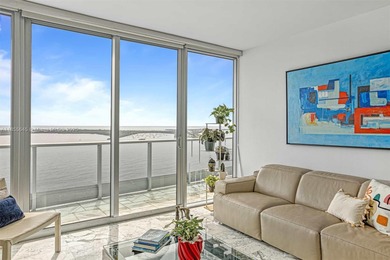 Prime location amid local conveniences, Biscayne bay views! This