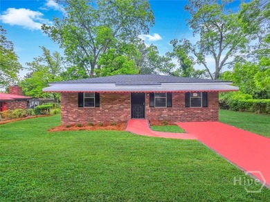 Come home to this recently renovated, all-brick, move-in-ready - photo 1