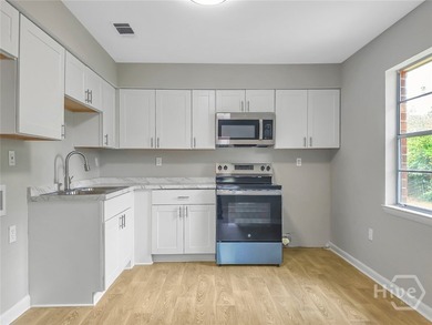 Come home to this recently renovated, all-brick, move-in-ready - photo 6