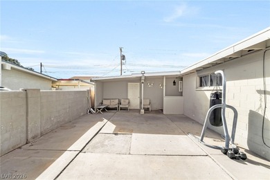 This single-story home offers three bedrooms and two full