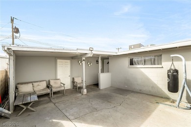 This single-story home offers three bedrooms and two full