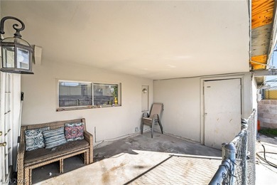 This single-story home offers three bedrooms and two full