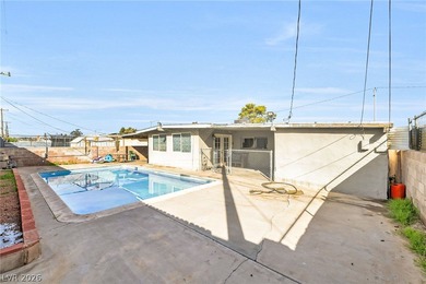 This single-story home offers three bedrooms and two full