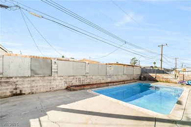 This single-story home offers three bedrooms and two full