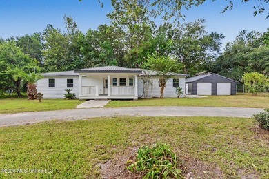What a beautifully remodeled home on two lots with a metal - photo 1