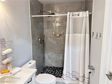 This charming townhouse features 2 bedrooms, 2 full bathrooms - photo 19