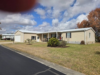 This beautiful 4-bedroom, 2-bath lakefront home sits on a - photo 3