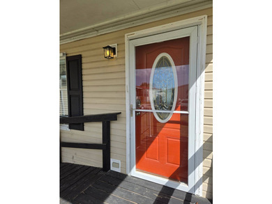 This beautiful 4-bedroom, 2-bath lakefront home sits on a - photo 4