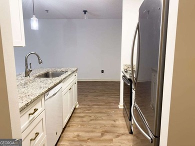 Welcome to this beautiful 3rd-floor condo in the prestigious 55+