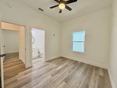 Coastal charm meets breezy living in this eye-catching pink - photo 19
