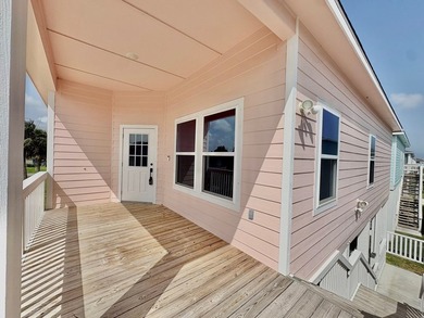 Coastal charm meets breezy living in this eye-catching pink - photo 30