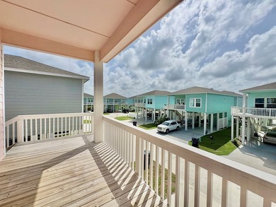 Coastal charm meets breezy living in this eye-catching pink - photo 31
