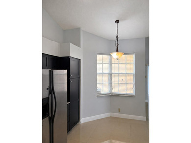 Beautifully maintained 3-bedroom, 2-bath home located in a - photo 2