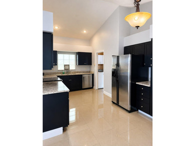 Beautifully maintained 3-bedroom, 2-bath home located in a - photo 3