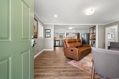 Welcome to 102 Country Club Dr., a pristine 2-bedroom, 1.5-bath - photo 2