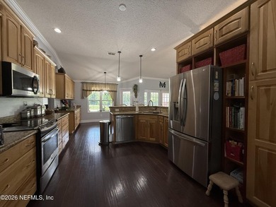 Set in a quiet, established neighborhood, this all-brick 4BR/3BA - photo 7