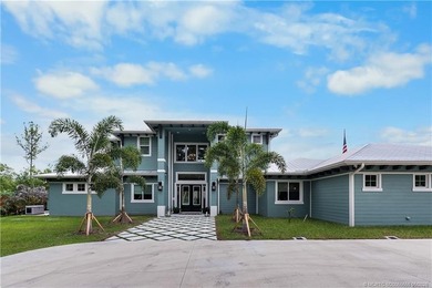 Behind a private electronic gate in prestigious Palm City Farms - photo 1