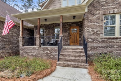 Welcome to luxury living in the prestigious gated community of - photo 3