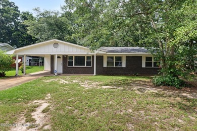 Welcome home! This updated 3-bedroom, 2-bathroom sits in a quiet - photo 1