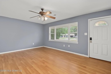 Welcome home! This updated 3-bedroom, 2-bathroom sits in a quiet - photo 7