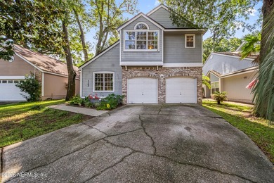 Storybook curb appeal in this quiet Ft. Caroline neighborhood - photo 1